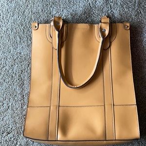 Emillie M. Purse,buckle to close.Mini pouch inside